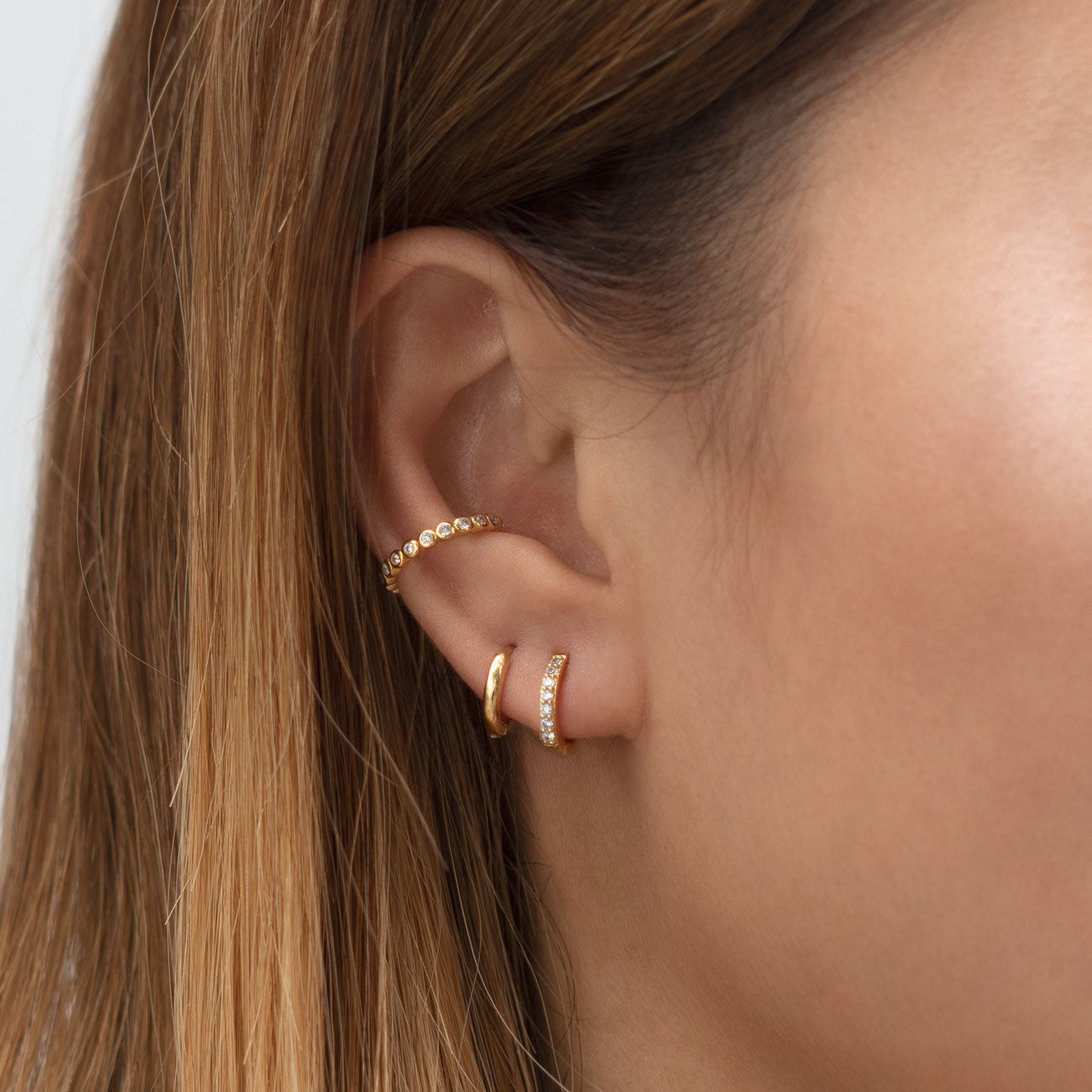 Cave - Zirconia Huggie Earrings