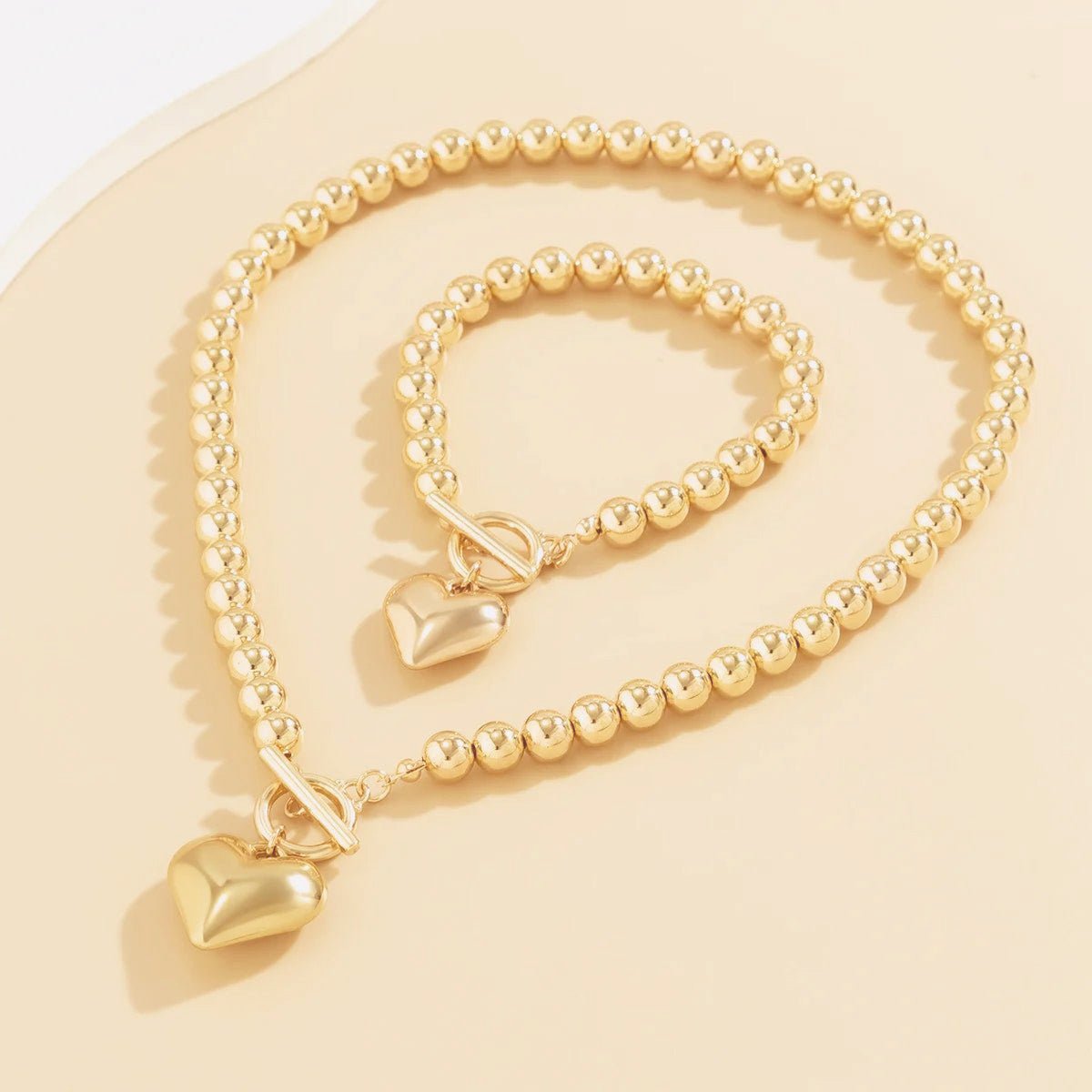 Calira - Beaded Heart Pendant Bracelet and Necklace Set Gold