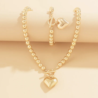 Calira - Beaded Heart Pendant Bracelet and Necklace Set Gold