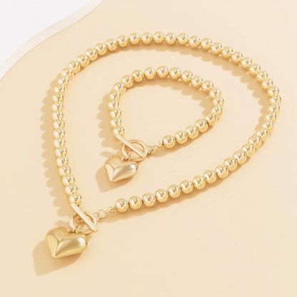 Calira - Beaded Heart Pendant Bracelet and Necklace Set Gold